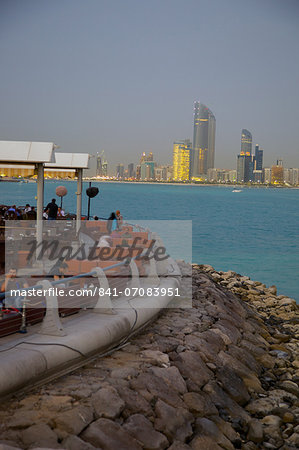 View of city from Marina Cafe at dusk, Abu Dhabi, United Arab Emirates, Middle East