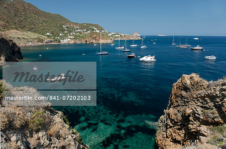 Yachts in the bay off Capo Milazzese on Panarea, The Aeolian Islands, UNESCO World Heritage Site, Messina Province, off Sicily, Italy, Mediterranean, Europe