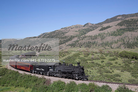 New Mexico and Colorado, Cumbres and Toltec Scenic Railroad, National Historic Landmark, narrow guage, steam powered locomotives, with tourist cars, United States of America, North America