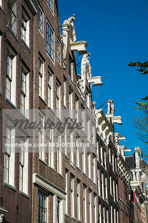 Gabled houses by a canal, Amsterdam, Netherlands, Europe