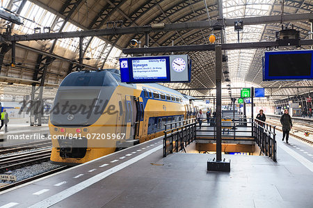 Intercity train in a platform at Central Station, Amsterdam, Netherlands, Europe