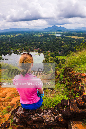 Sigiriya Rock, tourist enjoying the view over the Sri Lankan landscape, Sri Lanka, Asia