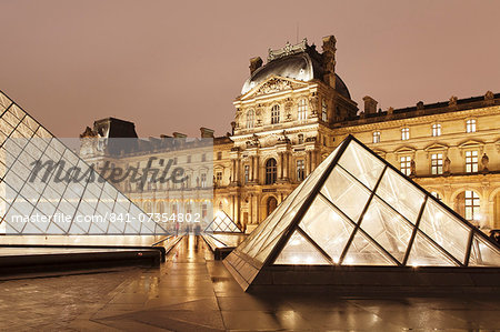 Illuminated Louvre Museum and Pyramid at night, Paris, Ile de France, France, Europe