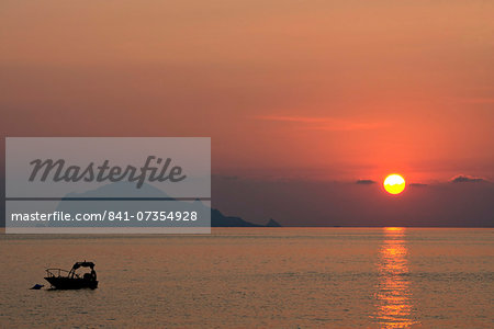 A view to Filicudi Island from Salina Island at sunrise in The Aeolian Islands, UNESCO World Heritage Site, off Sicily, Messina Province, Italy, Mediterranean, Europe