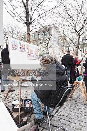 Painter at the art market at Place du Tertre, Montmartre, Paris, Ile de France, France, Europe