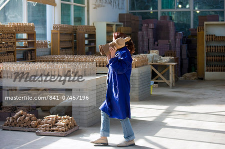 Terracotta Warrior souvenirs being made in factory, Xian, China