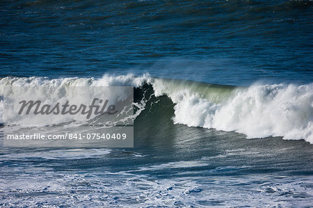 Rolling waves in the sea at Woolacombe, North Devon, UK