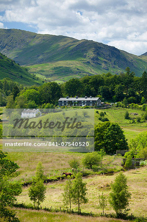 Cottages in Langdale Pass surrounded by Langdale Pikes in the Lake District National Park, Cumbria, UK