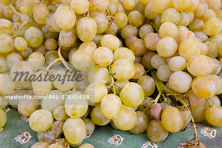Fresh green grapes on sale at weekly street market in Panzano-in-Chianti, Tuscany, Italy