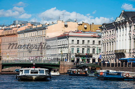 Tourist boat on a water channel in the center of St. Petersburg, Russia, Europe