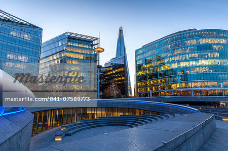 The scoop, an amphitheatre next to the GLC building, at More London with the Shard behind, London Bridge, London, England, United Kingdom, Europe