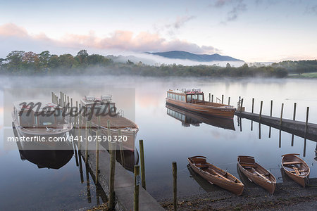 Boats moored on Derwentwater near Friar's Crag in autumn, Keswick, Lake District National Park, Cumbria, England, United Kingdom, Europe