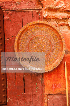 Copper plate on wall in the Medina, Marrakech, Morocco, North Africa, Africa