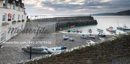 Clovelly harbour at dawn, North Devon, England, United Kingdom, Europe Clovelly harbour at dawn, North Devon, England, United Kingdom, Europe