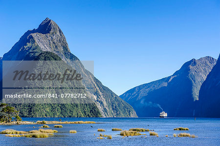 Cruise ship passing through Milford Sound, Fiordland National Park, UNESCO World Heritage Site, South Island, New Zealand, Pacific