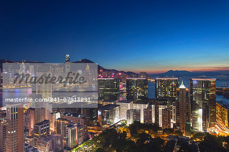 View of Hong Kong Island and Tsim Sha Tsui skylines at dusk, Hong Kong, China, Asia View of Hong Kong Island and Tsim Sha Tsui skylines at dusk, Hong Kong, China, Asia