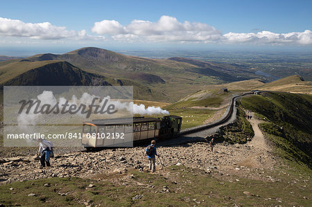 Snowdon Mountain Railway train and the Llanberis path, Snowdon, Snowdonia National Park, Gwynedd, Wales; United Kingdom, Europe