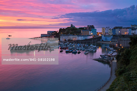 View over harbour and castle at dawn, Tenby, Carmarthen Bay, Pembrokeshire, Wales, United Kingdom, Europe
