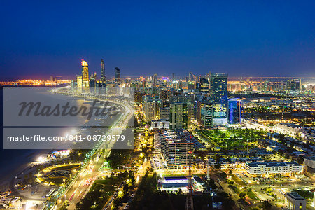 Skyline and Corniche, Al Markaziyah district by night, Abu Dhabi, United Arab Emirates, Middle East