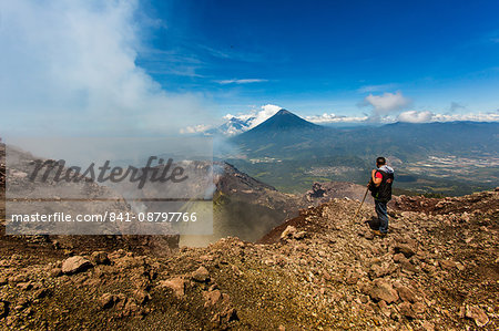 Cresting the peak of Pacaya Volcano in Guatemala City, Guatemala, Central America Cresting the peak of Pacaya Volcano in Guatemala City, Guatemala, Central America