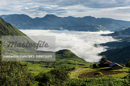 Valley filled with cloud in Andes central highlands, hiding the Nariz del Diablo railway below Chunchi, Ecuador, South America