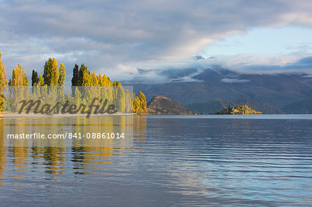 View across tranquil Lake Wanaka, autumn, Roys Bay, Wanaka, Queenstown-Lakes district, Otago, South Island, New Zealand, Pacific