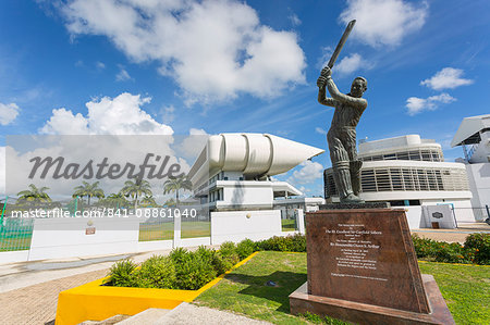 Garfield Sobers statue and The Kensington Oval Cricket Ground, Bridgetown, St. Michael, Barbados, West Indies, Caribbean, Central America