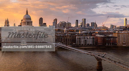 The view of the City of London from Tate Modern with the Millennium Bridge over the River Thames, and St. Paul's Cathedral, London, England, United Kingdom, Europe