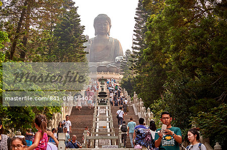 Visitors make the climb to see Big Buddha, Po Lin Monastery, Ngong Ping, Lantau Island, Hong Kong, China, Asia