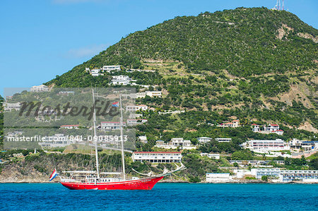 Red sailing boat in the bay of Philipsburg, Sint Maarten, West Indies, Caribbean, Central America