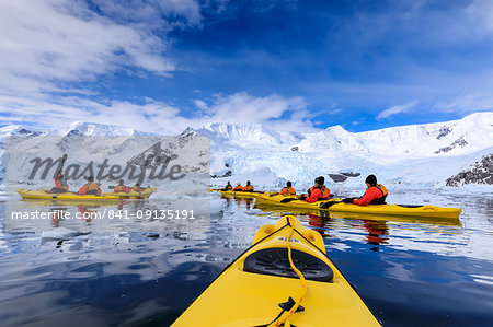 Kayaking amongst spectacular icebergs, mountains and glaciers, sunny Neko Harbour, Anvord Bay, Antarctic Peninsula, Antarctica, Polar Regions