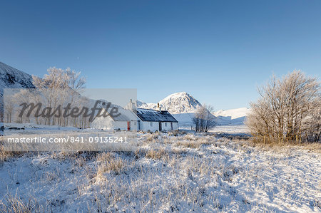 A winter scene at Black Rock cottage and Buachaille Etive Mor on Rannoch Moor, Highlands, Scotland, United Kingdom, Europe
