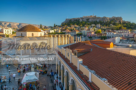 Elevated view of Monastiraki Square with The Acropolis visible in background during late afternoon, Monastiraki District, Athens, Greece, Europe