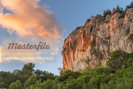 Last sunlight illuminating the rocks at Cape Osejava near Makarska, Croatia, Europe