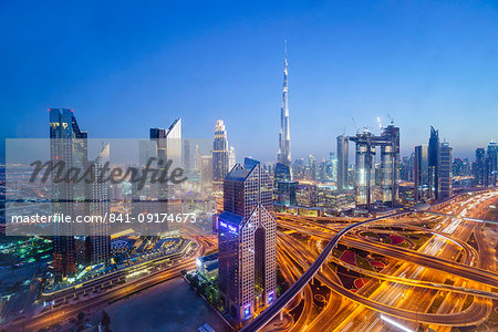 Dubai skyline with Burj Khalifa and Sheikh Zayed Road Interchange, Dubai, United Arab Emirates, Middle East