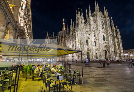 View of Duomo di Milano illuminated at night from Galleria Vittorio Emanuele II in Piazza Del Duomo at dusk, Milan, Lombardy, Italy, Europe
