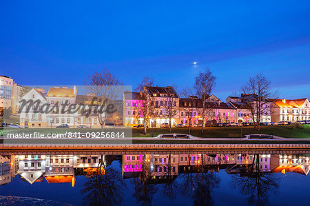 Trinity Suburb reflecting in the Svislach river, Minsk, Belarus, Eastern Europe