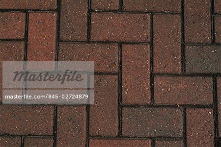 Backgrounds - red herring-bone paving bricks