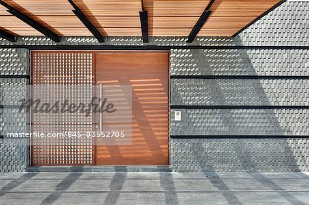 Doorway. Main entrance. House on Sentosa island, Singapore. Designed by Lim Cheng Kooi/AR43. Completed December 2009.  Architects: Lim Cheng Kooi and AR43