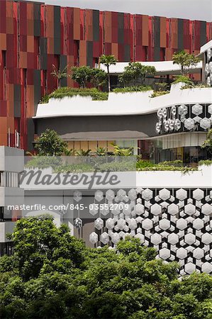 Exterior of iluma shopping and cinema complex in Singapore by WOHA Facade lighting by realities united.  Architects: WOHA