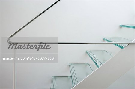 Glass tread staircase and handrail in a Victorian house, Wandsworth, London. Architects: Luis Treviño Fernandez