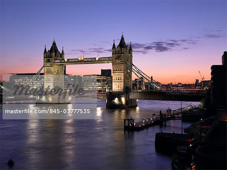 Tower Bridge and river thames at dusk, London. Looking west.