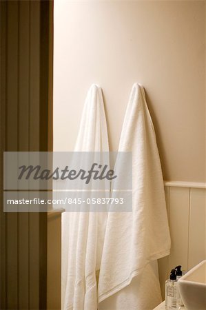 White towels hanging in a bathroom