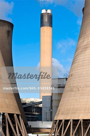 View of the main chimney stack between two cooling towers at Drax power station, North Yorkshire. Drax is the UK's largest coal-fired power station.