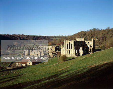 Rievaulx Abbey. View down to Abbey from NE Showing museum and monastery buildings .