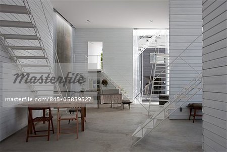 Yokohama Apartment, Apartment house, View of the dining and kitchen area on the ground floor, looking towards the west. Architects: Osamu Nishida + Erika Nakagawa, ON Design