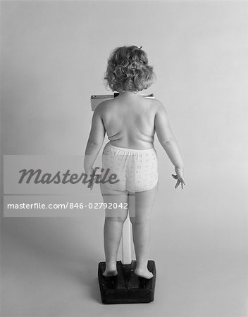 Little Girl In Panty Over White Stock Photo, Picture and Royalty