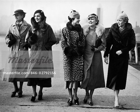 1930s FIVE WOMEN WALKING WEARING WINTER FUR COATS