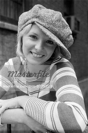 1970s PORTRAIT FEMALE IN FLOPPY WOOL VISOR CAP AND STRIPED KNIT TOP