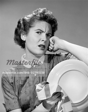 https://image1.masterfile.com/getImage/846-02793138em-1950s-frustrated-tired-angry-woman-holding-plate-and-dish-towel.jpg